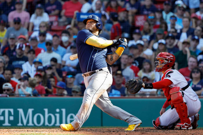 Aug 28, 2022; Boston, Massachusetts, USA; Tampa Bay Rays first baseman Harold Ramirez (43) follows through on an RBI single against the Boston Red Sox during the sixth inning at Fenway Park.